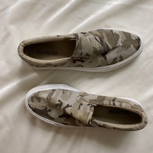 Camo platform slip on sneakers